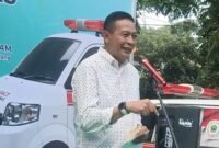 Wali Kota Malang, Wahyu Hidayat atau yang akrab disapa masyarakat dengan Pak Mbois memberikan sambutan di lounching mobil ambulance Sahabat Sam Anas, Minggu (25/01/2026). (Foto : Kim)