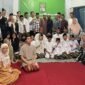 Momentum foto bersama pengurus, kader dan anggota DPD PITI Malang Raya bersama anak yatim. (Foto : Aliya)